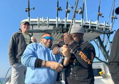 Fishing on back of charter fishing boat