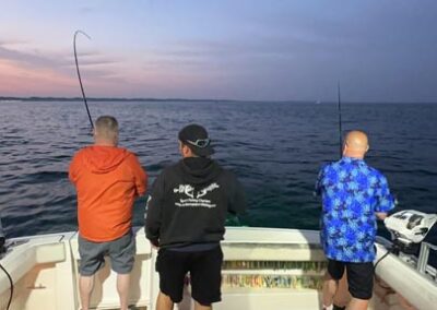 Evening fishing photo on back of boat